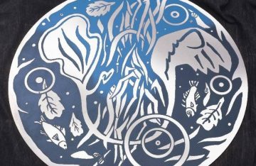 Four foot diameter engraved stainless steel