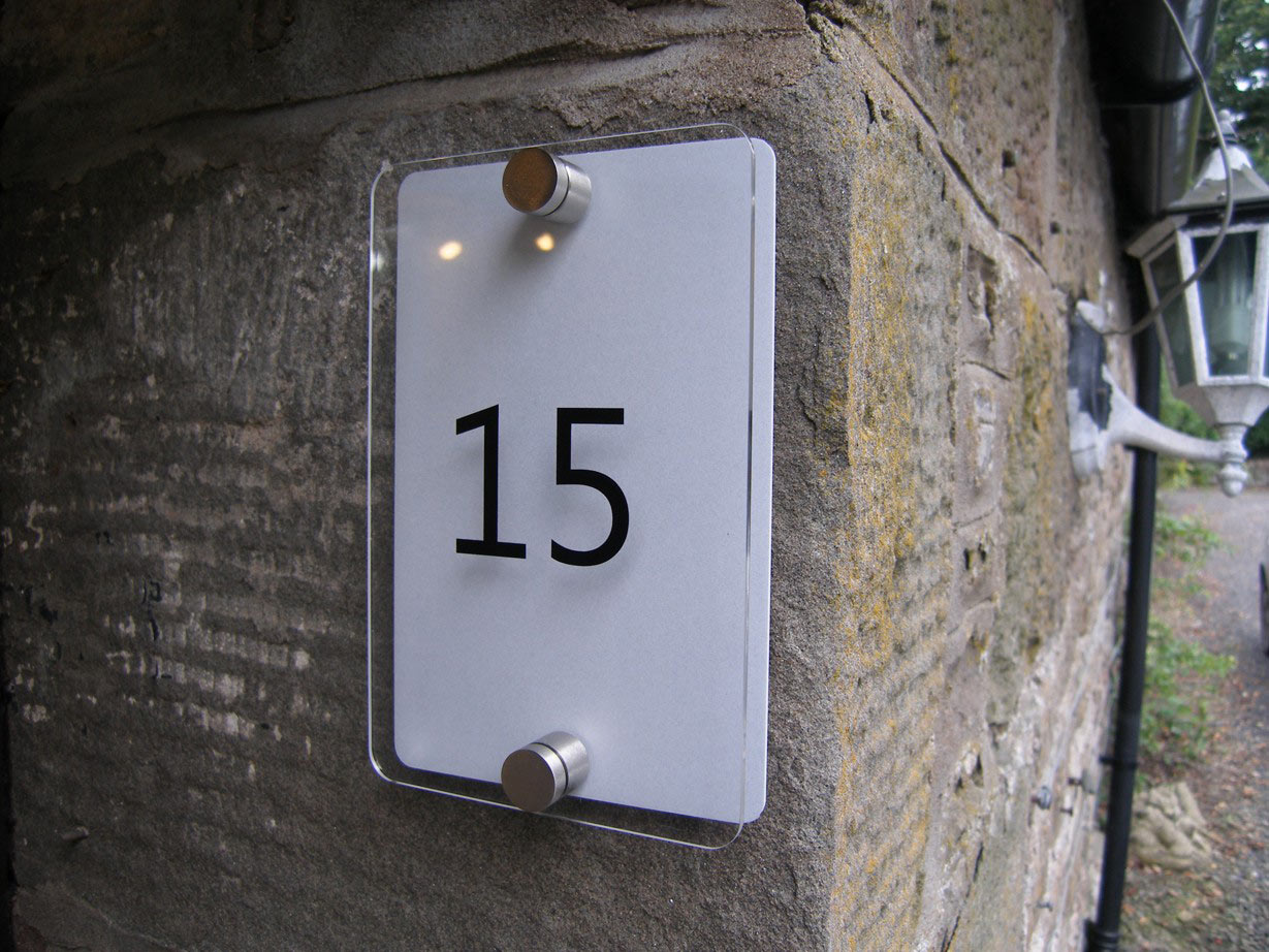 Fixing house signs